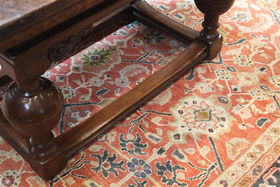 A mid 17th century Dutch oak draw leaf table extended 7ft 1.5in.